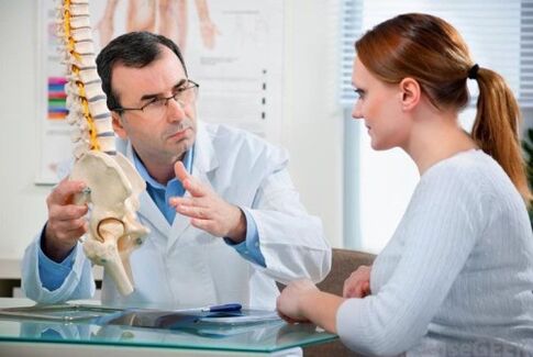 konsultacja z lekarzem w sprawie osteochondrozy lędźwiowej